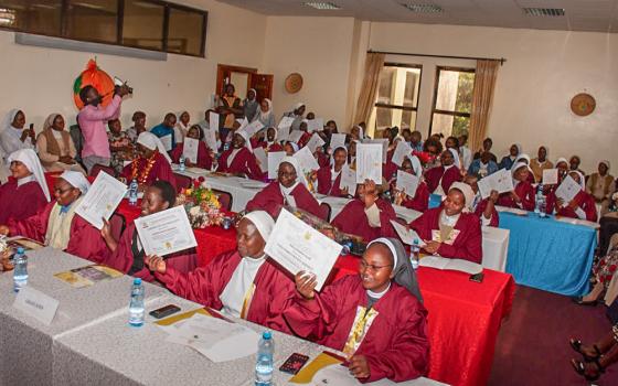 Graduates of the Hilton-Hekima Sisters Scholars Program toss their certificates in celebration after the May 2024 graduation. (Courtesy of Religious Sisters Communicators' Foundation Uganda)